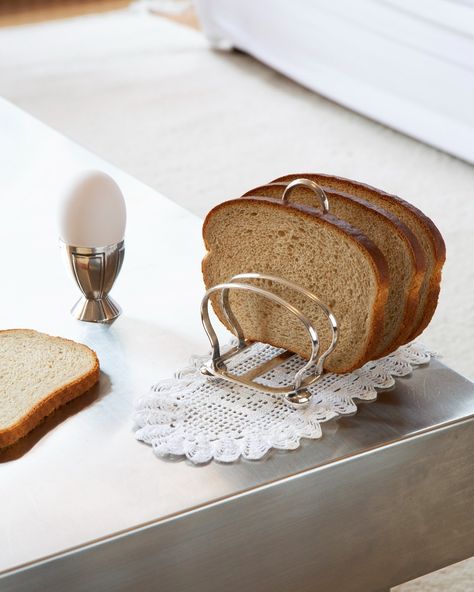 A ritual not to be missed. Gohar Old World introduces a collection of Breakfast in Bed objects from the past, repurposed to make every day special. Bean-shaped toast racks, egg cruets, and silver platters that never go out of style – shop the collection, online now at @gohar.world. Ph @rheak. Silver Platters, Toast Rack, Breakfast In Bed, Go Out, Out Of Style, Old World, Exterior Design, Ritual, Interior And Exterior