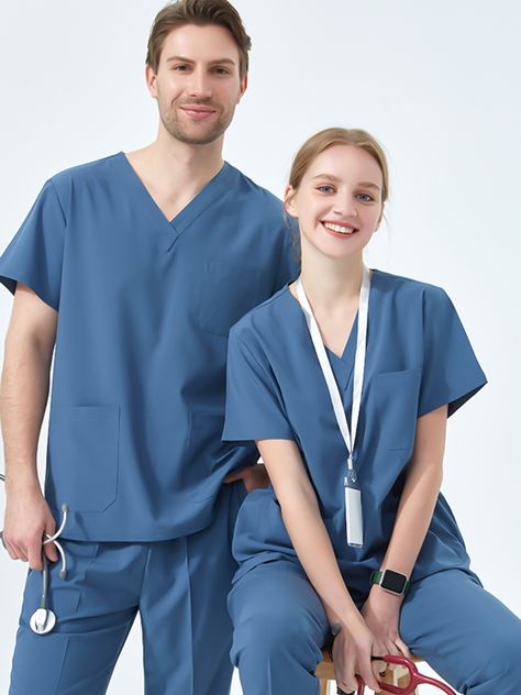 Perfect for medical professionals, this ceil blue scrubs quick-dry scrub top and pant set is crafted from a stretch polyester and spandex blend. Quick-drying technology ensures you stay dry and comfortable during long shifts. Enjoy the perfect fit and feel of this light, professional scrub set. This scrub top and pant set is designed for durability with reinforced stitching and fade-resistant dye technology. Maximize your comfort with breathable fabric, and benefit from flexibility with a 4-way Lab Coats For Men, Ceil Blue Scrubs, Doctor Scrubs, Stylish Scrubs, Navy Scrubs, Doctor Dress, Fit Scrubs, Doctor Outfit, Men's Uniforms