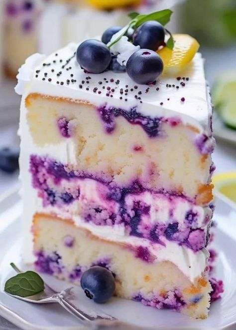 Jamie Oliver | Lemon Blueberry Cheesecake Cake- This is such a great recipe | Facebook Lemon Blueberry Pudding Cake, Blueberry Lemon Cheesecake Cake, Blueberry Cheesecake Cake Recipe, Lemon Blueberry Cheesecake Cake Recipe, Lemon Cheesecake Birthday Cake, Lemon Blueberry Layer Cake Recipes, Lemon Blueberry Cake With Cream Cheese Frosting, Lemon Blueberry Birthday Cake, Spring Cheesecake Recipes