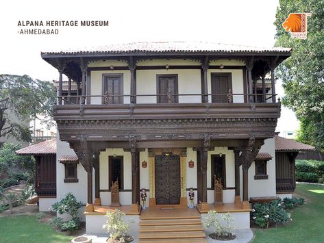 Alpana Heritage Museum is built in Gujarati Haveli style with traditional carvings in rich teakwood. This haveli cum museum is owned by Gujarati business family and their love for preserving heritage can be observed during your visit here. The museum is surrounded by a beautiful garden and exhibits silver and bronze artefacts collected by the owners from across the world, family heirlooms and exquisite textiles. #MuseumsofGujarat #VisitGujarat Gujarati House, Wooden Architecture, Rural House, Heritage Museum, Indian Architecture, Village House Design, Indian Home, Indian Home Decor, Village Houses