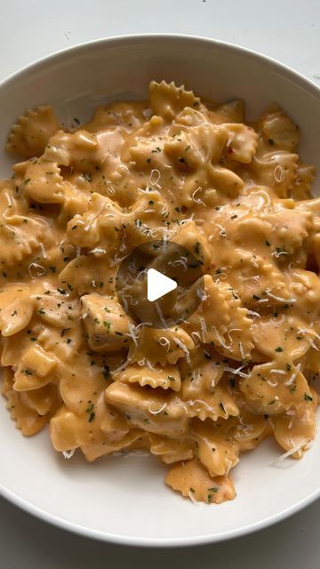 2.4M views · 476K likes | Angela Miley on Instagram: "FarFALLIN for this pasta 🍝 Cheesy Buffalo Chicken with Farfalle aka Bowtie Pasta 😋 RECIPE ⬇️ 

1. Cook 1/2 lb pasta in salted water until al dente.
2. Add olive oil to a pan and 2 chicken breasts cut into bite sized pieces. Season your chicken. 
3. When the chicken is cooked, remove from the pan (optional: mix chicken with Buffalo sauce) then add 3 tbsp of butter.
4. Add 3 cloves minced garlic and 1/2 a diced onion. Cook for a few minutes. 
5. Add 1.5 cups heavy cream. When simmering, lower the heat. Season your sauce. 
6. Add 1/4 cup Asiago, 1/2 cup cheddar and 1/2 cup mozzarella.
7. Add pasta water & mix until creamy. Add 1/2 cup Buffalo sauce. 
8. Add your cooked pasta & chicken to your sauce. Enjoy! #thesecarbsdontcount" Chicken With Buffalo Sauce, Farfalle Pasta Recipes, Bow Tie Pasta Recipe, Cheesy Buffalo Chicken, Pieces Season, Buffalo Chicken Pasta, Farfalle Pasta, Pasta Chicken, Cooked Pasta