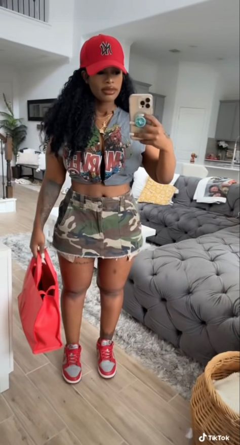 Shorts Concert Outfit Ideas, Graphic Tee Dress Outfit Black Women, Camo And Red Outfit Women, Camouflage Skirt Outfit Black Women, Camo Shorts Outfit Women Summer, Army Shorts Outfit Black Women, Baseball Game Outfit Black Women, Camo Shorts Outfit Black Women, Bowling Outfit Black Women