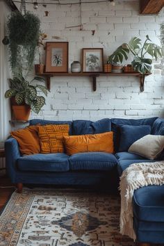 Navy Sofa Living Room Curtains, Blue And Orange Boho Living Room, Blue Couch Living Room Ideas Boho, Peacock Blue Couch Living Room, Vibrant House Decor, Blue Boho Living Room Inspiration, Blue Living Room Furniture Ideas, Boho Blue Couch, Navy Couch Styling