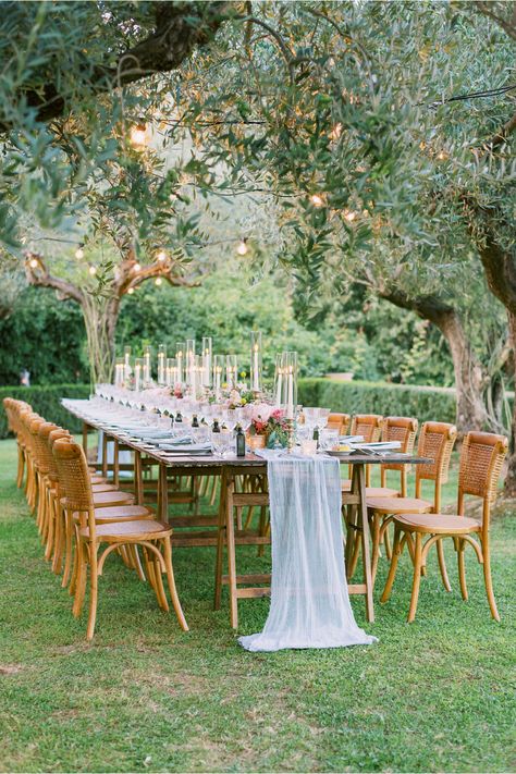 From the editorial "This Couple Got Married at Sting's Villa in Tuscany and It Was Nothing Short of Spectacular." The reception dinner took place in the Tuscan hills under sparkling olive trees with romantic floral arrangements that were absolutely dreamy. Just wait until you see the full gallery!  ​Photography: @eliaskordelakos  #tuscanywedding #destinationwedding #alfrescowedding #weddingreception #gardenwedding Candles And Flowers, Alfresco Wedding, Romantic Italian, Garden Wedding Reception, Villa Wedding, Outdoor Dinner, Table Set Up, Tuscany Wedding, Wedding Dinner