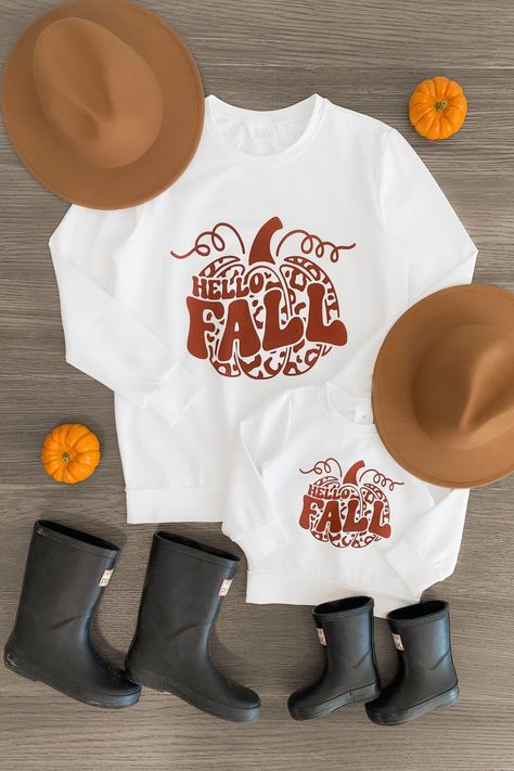 You and your little girl will be so cute matching in your "Hello Fall" White Long Sleeve Tops. The white long sleeve top has an adorable fall design on the front and comes in adult and child sizes. Shop online today! White Long Sleeve Tops, Mommy Daughter Outfits, Sparkle In Pink, Top Reads, Fall White, Fun Pumpkins, Children Top, Long Sleeve Design, Design Mom