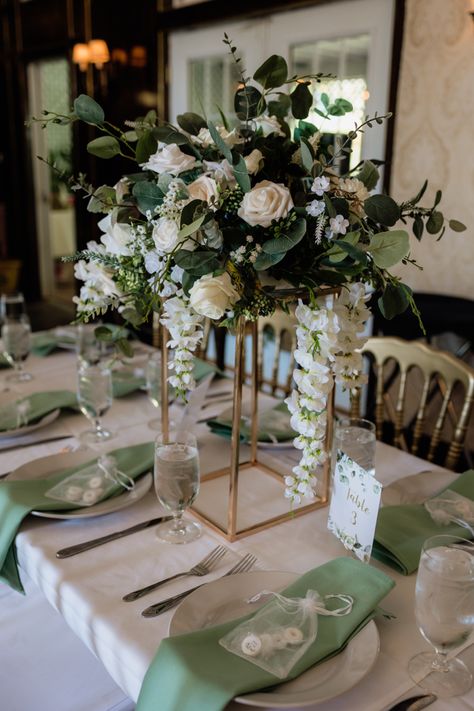 Olive Green And Gold Wedding Centerpieces, Unique Centre Pieces, Sage Green And Grey Wedding Centerpieces, Sage Green Wedding Rustic Table Settings, Sage Green Wedding Table Centerpieces, Wedding Sage Green Decor, White And Sage Centerpiece Wedding, Ivory And Sage Wedding Table Setting, Wedding Tables Sage Green