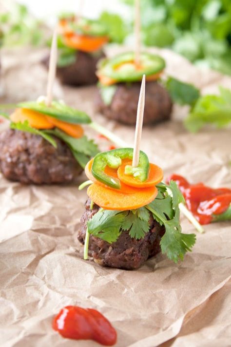 18 Fusion Foods to Whip Up This Week | Brit   Co Healthy Nuggets, Appetizers Savory, Meatball Bites, Pork Sisig, Porcupine Meatballs, Happy Food, Vietnamese Cuisine, Asian Fusion, Banh Mi