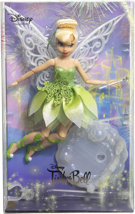 PRICES MAY VARY. Commemorate Disney 100 Years of Wonder with this beautiful Tinker Bell collector doll, inspired by the Disney movie Peter Pan. Tinker Bell’s classic fairy look is reimagined in sparkling detail, featuring a leaf-inspired, embroidered applique and a petal skirt with an ombre print—all in her signature green color. With a set of intricately detailed wings that appear sprinkled with pixie dust, Tinker Bell is ready for adventures in Never Land and beyond! To complete her magical lo Disney Collector Dolls, Disney Princess Doll Collection, Disney 100 Years Of Wonder, Tinkerbell Doll, Christmas Cookie Boxes, Disney 100 Years, Baby Musical Toys, Mattel Shop, Disney Princess Dolls