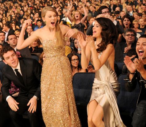 That year, Taylor won for favorite female country artist, favorite country album (Speak Now), and artist of the year.                  Source: Getty / Jeff Kravitz/AMA2011 Celebrities With Fans, Grammys Red Carpet, Selena And Taylor, Selena Gomez Cute, Selena Gomez Pictures, Speak Now, Mtv Videos, Teen Choice Awards, Mtv Video Music Award