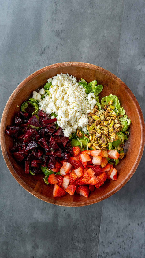 Get ready to crunch and munch your way to veggie heaven with our Shaved Brussels Sprout Salad! This vibrant dish combines tender marinated beets, succulent strawberries, and earthy pistachios atop a bed of delicate shaved Brussels sprouts. Drizzled with a luscious balsamic glaze dressing, each bite is a celebration of freshness and flavor. It’s a feast for the senses that will leave you craving for seconds! Beet Brussel Sprout Salad, Marinated Beets, Shaved Brussel Sprout Salad, Shaved Brussel Sprouts, Brussels Sprout Salad, Sprout Salad, Sliced Strawberries, Brussels Sprout, Brussel Sprout Salad