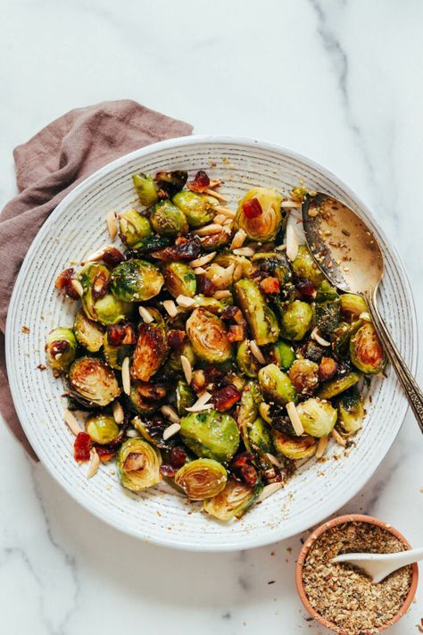 If there’s a list of the most misunderstood veggies, Brussels sprouts are likely at the top. But when done right (roasted until crispy), they’re downright drool-worthy! And when tossed with crunchy nuts, sweet honey, and savory dukkah seasoning (like at Aba in Austin)? Next level! This 7-ingredient crowd-pleasing side comes together in just 30 minutes and is worthy of impressing dinner guests or serving at the holiday table. Crispy Roasted Brussels Sprouts with Dukkah & Honey from Minimalis Hummus Wrap, Minimalist Baker, Egyptian Inspired, Roasted Brussels Sprouts, Sprout Recipes, Brussels Sprouts Recipe, Roasted Brussel Sprouts, Vegetarian Food, Brussels Sprouts