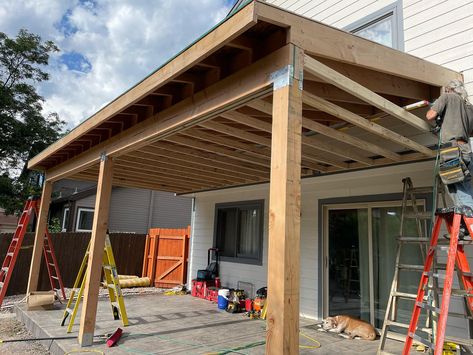 🌞 Elevate your outdoor space with a custom-designed patio overhang! 🌿 We can design it exactly how you like, creating the perfect blend of style and functionality. Imagine a space where you can relax, entertain, and enjoy the outdoors, no matter the weather. Check out this stunning example and start envisioning your dream patio! 🏡✨ #CustomDesign #OutdoorLiving #PatioPerfection #HomeUpgrade #BackyardHaven #ShadeSolutions #StonebrookConstructionGroup #FortCollins Garage Expansion, Patio Overhang, Porch Overhang, Deck Roof, Framing Construction, Dream Patio, Patio Enclosures, Handy Man, Patio Cover