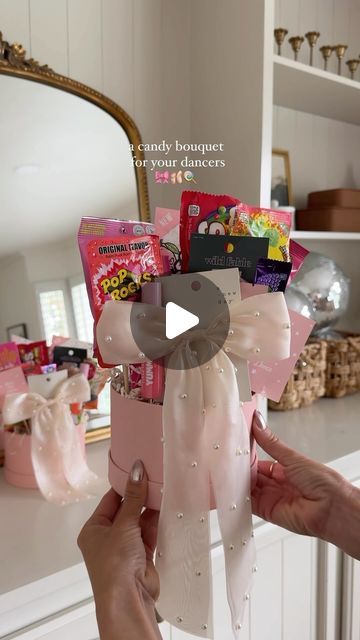 Deborah Trette on Instagram: "dance recital season has entered the chat 💬 here is a cute way to gift your performers something sweet! these are for my 9 + 11 year olds — you can customize according to age! 

+candy (sweet and savory)
+chocolate bars
+eye masks
+lipgloss
+gift cards
+hair clips
etc!

save + share! 🔗 under @shop.ltk 
@threadmama_story has super cute dance printables too!

#diy #diygift #giftidea #giftbox #giftforher #dancer #graduation #gradgift #candybouquet #diybouquet #diycrafts #diymom #momlife" Diy Recital Gifts, Ballet Recital Bouquet Ideas, Dance Recital Gifts Diy Ideas, Dance Gift Basket, Dance Big Sister Gifts, Ballet Gift Ideas, Dance Buddy Gifts Ideas, Dance Sister Gift Ideas, Diy Dance Gifts