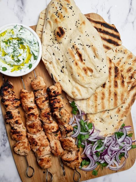 As the weather is getting milder, I decided to dust off my BBQ and cook up some kebabs! I absolutely love this recipe for chicken shish kebabs and make it a couple of times a month. It's relatively healthy, especially if you add lots of salad and low fat yoghurt, but it also packs a serious punch in the flavour stakes so feels like a treat, even though it is healthy.I've included the cooking instructions here for a domestic grill and a griddle pan to cook the chicken and flatbreads as… Shish Kebabs, Homemade Flatbread, Apple Cinnamon Oatmeal, Shish Kebab, Griddle Recipes, Chicken And Wild Rice, Recipe For Chicken, Cinnamon Oatmeal, Vegan Black Bean