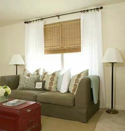 Curtains with couch under window. Decorate Above Couch, Narrow Living, Behind Couch, Narrow Living Room, Ceiling Curtains, Wooden Shades, Bamboo Curtains, White Drapes, Bamboo Shades