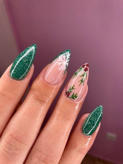 Green Mistletoe Nails, Almond Winter Acrylic Nails, Mistletoe Acrylic Nails, Green Almond Nails Christmas, Short Almond Acrylic Nails Christmas, Mistletoe Nails Christmas, Christmas Almond Nails Green, Winter Christmas Nails Green, Nails Xmas Design