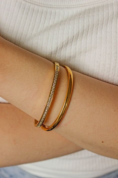 PRODUCT DESCRIPTION The trend of stacking jewellery isn't just having a moment, it is the moment. Confused about the stacking jewellery trend? Let us do the hard work for you. Your weekend arm candy is all sorted with our Vibes Bangles Stack Set. This sleek set of 2 is all you need for casual days to dressy nights out.They're each incredibly chic and absolutely perfect for any occasion comi...#of #of #StatementJewelry #Stack #of #Jewelry #Adornment #Art #the #Mastering #Accessories #The #the Gold Sleek Bangles, Plain Gold Bangles, Jewelry Stack, Gold Bracelets Stacked, Gold Bangles For Women, Gold Chain Design, Bangles Design, Indian Jewelry Sets, Bangles Jewelry Designs