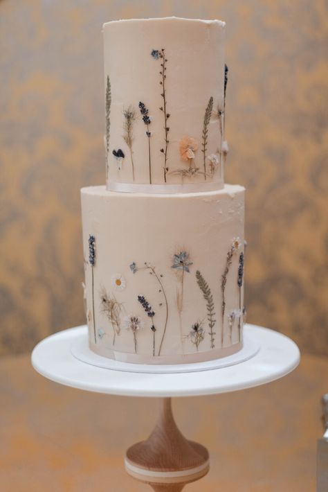 Edible pressed flower 2 tier buttercream wedding cake decorated with garden scene tyoe flowers in shades of blue, white and yellow | Hedsor House London UK 2 Tier Buttercream Cake, Wedding Cake Buttercream Flowers, 2 Tier Wedding Cakes, Yellow Wedding Cake, Willow Oak, Hedsor House, Edible Flowers Cake, London Cake, Floral Wedding Cake