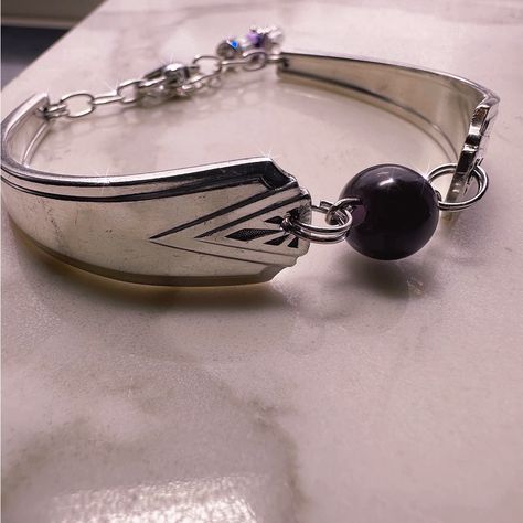 Step Into The Past With This Stunning Vintage Spoon Bracelet, Meticulously Crafted From Authentic Deauville Silver-Plated Spoons Dating Back To 1929. Handmade By One Ida, This Exquisite Piece Exudes Timeless Charm And Elegance. Adorned With A Captivating Amethyst Accent, This Adjustable Bracelet Adds A Touch Of Sophistication To Any Ensemble. Specifications: Material: Silver-Plated Spoons Year: 1929 Maker: One Ida Gemstone: Amethyst Adjustable Sizing For A Comfortable Fit Embrace Vintage Glamour Cutlery Crafts, Vintage Spoon Jewelry, Spoon Jewelry Diy, Flatware Crafts, Silver Spoon Bracelet, Silver Spoon Jewelry, Silverware Crafts, Flatware Jewelry, Spoon Art