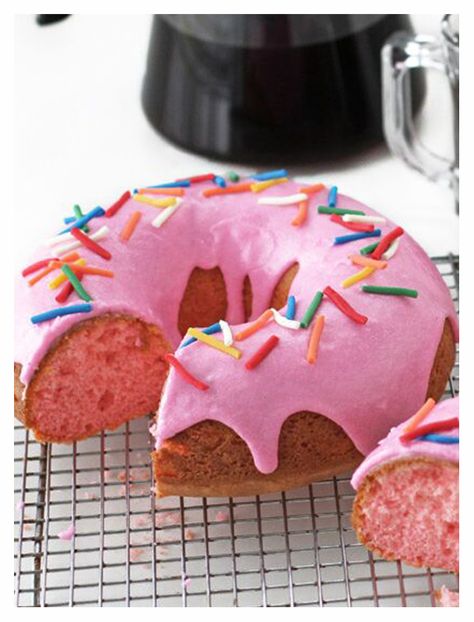 Pink Donut Cakes! Grab a cup of coffee and a slice of this heavenly strawberry cake. Doughnut Cake Birthday, Cake That Looks Like Donut, Cartoon Donut Cake, Giant Donut Cake, Pink Sprinkle Donut Cake, Krispy Kreme Pink Donut, Simpsons Cake, Shopkins Cake, Donut Dessert