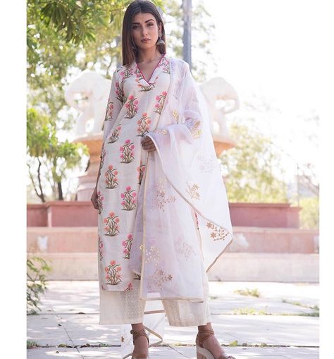 Image may contain: 1 person, standing Trendy Outfits Indian, White Kurta, Silk Bottoms, Silk Kurta, Hijabi Outfits Casual, Simple Pakistani Dresses, Indian Designer Wear, Kurta Set, Designer Wear