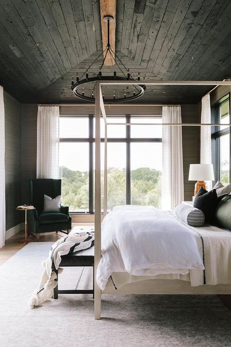 Black oak plank vaulted ceiling above a bedroom showcasing a black round chandelier with a light gray wooden canopy bed and a black bench at the foot. Ceiling With Wood, Modern Rustic Bedroom, Vaulted Ceiling Bedroom, Wooden Canopy Bed, Bria Hammel Interiors, Modern Rustic Bedrooms, Bria Hammel, Wood Beam, Modern Mountain Home