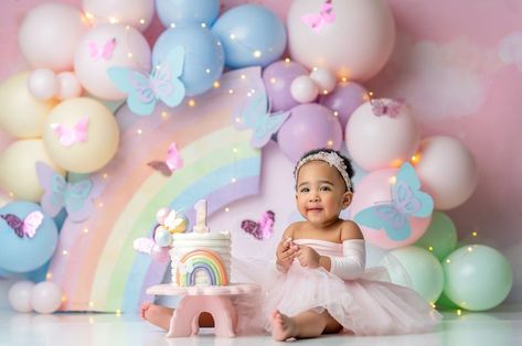 Pastels Cake Smash, Butterflies And Rainbows Birthday, Smash Cake Colorful, Pastel Rainbow Photoshoot, Rainbow Birthday Photoshoot, Pastel Rainbow Cake Smash, 1st Birthday Rainbow Theme, Rainbow Balloon Backdrop, Pastel First Birthday Party