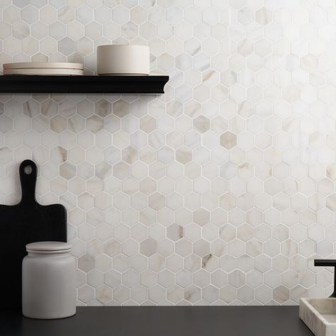 Shop White Jade 2" Hexagon Polished Marble Mosaic. About The Tile: Tradition with a twist, the White Jade 2" Hexagon Polished Marble tile is a beautiful marble piece that offers a modern, small-scale geometric pattern. With a polished creamy white body and beige veining throughout, it adds a touch of luxury to any design.Perfect for backsplashes, floors, or accent walls. Key Features High-end Authentic Marble Tile. Modern Small-Scale 2” Hexagon Format. Elegant White Body with Beige Veining. Styl Honeycomb Tiles Kitchen, Hexagon Tile Backsplash Kitchen, Hexagon Tile Kitchen, Penny Tile Backsplash, Marble Mosaic Backsplash, Hexagon Tile Bathroom, Hexagon Tile Backsplash, Luxurious Kitchen Design, Neutral Backsplash Kitchen