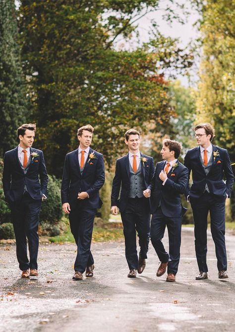 Warm Autumn wedding - Groom and groomsmen in dark blue suit with orange ties Blue And Orange Suit Men, Blue And Orange Groomsmen Suits, Navy Blue Groomsmen Suits Burnt Orange, Autumn Wedding Groomsmen, Autumn Groomsmen, Blue Suit Orange Tie, Autumn Wedding Groom, Grooms Getting Ready, Grooms Tuxedo