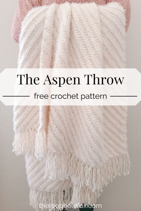 Embrace Hygge this season with the Aspen Throw, a crochet blanket pattern. This easy crochet throw blanket works up quickly, is beginner friendly and is perfect to cozy up in. You will love the diagonal ribbing and simplicity of the design. Created using only half double crochet stitches and sets of two row repeats, you'll be snuggled up in no time. Grab this free crochet pattern on The Loophole Fox. Modern Haken, Zig Zag Crochet, Crochet Throw Pattern, Throw Blanket Pattern, Chunky Crochet Blanket, Crochet Blanket Pattern Easy, Crochet Afghan Patterns Free, Half Double Crochet Stitch, Confection Au Crochet