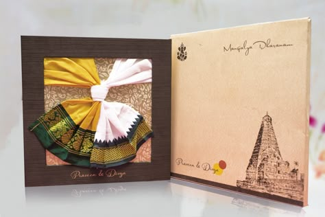 Indian creative Hindu wedding Invitation which brings the ancient and modern design together in the Wedding Invitation. This card depicts the Tamil culture where saree and dhoti are worn during the south Indian marriages. This wedding invite can use in all culture and it is one of the unique wedding card for Hindu traditional, The card can be modified accordingly for the user need. #sareedhoticard #indianweddingcard #weddingcard #tamilwedding #southindianmarriage Traditional Indian Wedding Cards, Book Themed Wedding Invitations, Hindu Wedding Invitation Cards, Wedding Card Design Indian, Marriage Invitation Card, Hindu Wedding Invitations, Hindu Wedding Cards, Unique Wedding Cards, Marriage Cards