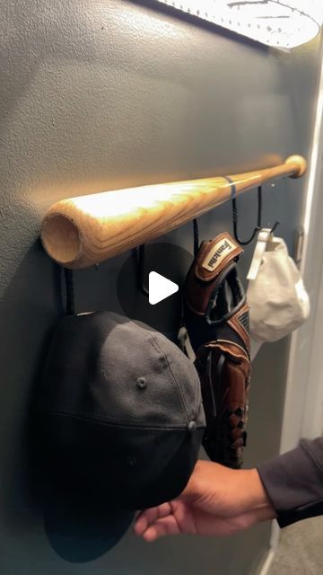 Mylan 🧠💡🤷🏽‍♂️ on Instagram: "DIY Baseball Bat Rack 🧠💡⚾️ #MotivatedByMylan" Diy Baseball Decor, Baseball Bat Rack, Baseball Man Cave, Diy Hat Rack, Baseball Decor, Instagram Diy, May 20, Baby Stuff, Baseball Bat