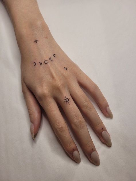 #tattoo, #tattoos, #inked, #tattooart, #tattooedwomen, #tattooedguys, #tattooinspiration, #tattooideas, #tattooworldwide, #tattoosociety, #InkLaughs, and #TattooFails​ Moon Finger Tattoo Designs, Celestial Finger Tattoos For Women, Minimalist Hand Tattoos For Women, Ataraxia Tattoo, Hand Tattoo Minimalist, Left Hand Tattoo, Tato Jari, Small Finger Tattoos, Hand And Finger Tattoos