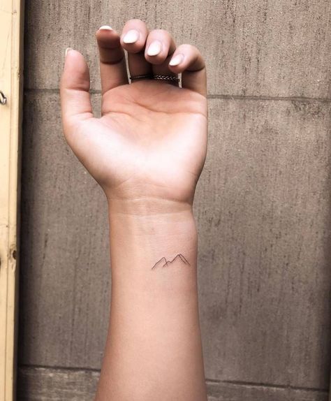 Mountain Tattoo On Wrist, Dainty Mountain Tattoo, Garden Buckets, Moutain Tattoos, Small Mountain Tattoo, Tattoo On The Wrist, Mountain Tattoo Simple, Tattoo On Wrist, Metal Buckets