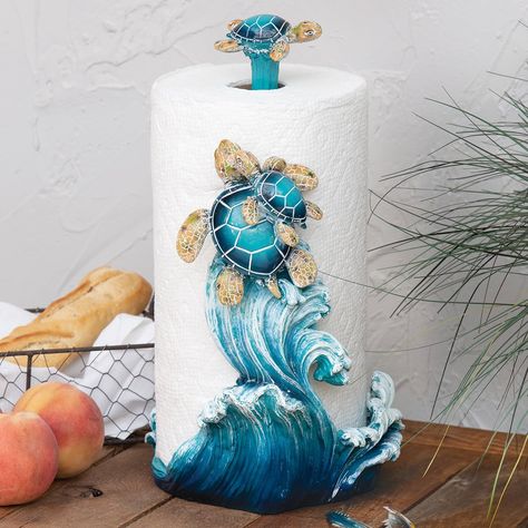 PRICES MAY VARY. 60 Day No Hassle Returns A Bella Coastal Decor Exclusive - Crashing waves and sea turtles accent this polyresin paper towel holder. 8 1/2"W x 10 1/2"D x 10 1/2"H. Coastal Bedroom Furniture, Metal Paper Towel Holder, Nautical Table, Beach House Interior Design, Turtle Decor, Turtle Gifts, Hanging Artwork, Beach Island, Island House