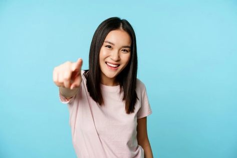 Free Photo | Its you smiling happy asian woman pointing finger at camera congratulating inviting people standing ... Hand On Head, Pointing Finger, Sisters Photoshoot Poses, Asian Models Female, Pointing Fingers, Girl Thinking, Smile Girl, Aesthetic Images, Free Photo