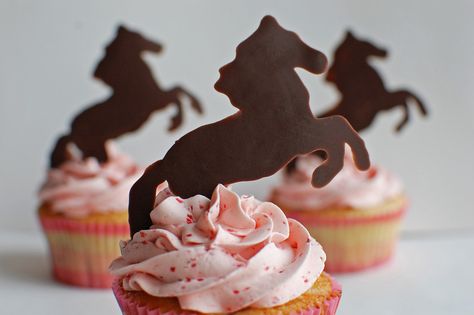 I made these equine cupcakes for a co-worker for her birthday.  She, like me, loves horses.  The horse cupcake toppers are chocolate and the cupcakes are Martha Stewart’s strawberry cupcakes with strawberry buttercream.  They were so light and tasty!  The only drawback is the frostingRead More Horse Themed Cupcakes, Horse Cupcakes Ideas, Easy Horse Cake, Horse Cupcake Cake, Horse Cake Ideas, Hope Cake, Horse Cupcakes, Horses Birthday, Horse Cakes