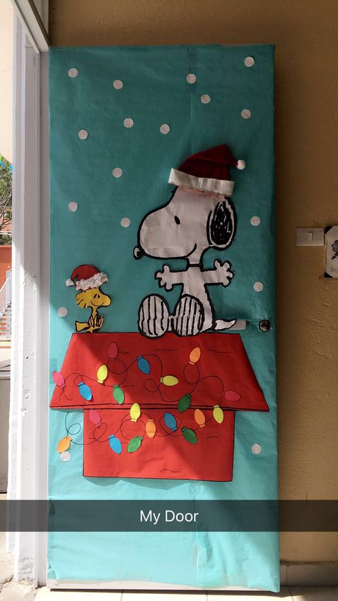 Snoopy Christmas door for my class 👌🏽👌🏽👌🏽 Peanuts Christmas Classroom Door, Peanuts Christmas Door Decoration, Christmas Dorm Door Ideas, Snoopy Door Decorations Christmas, Snoopy Christmas Door Decorations, Christmas Classroom Door Decorating Contest, Christmas Door Ideas For School, Snoopy Classroom Door, Snoopy Door Decorations