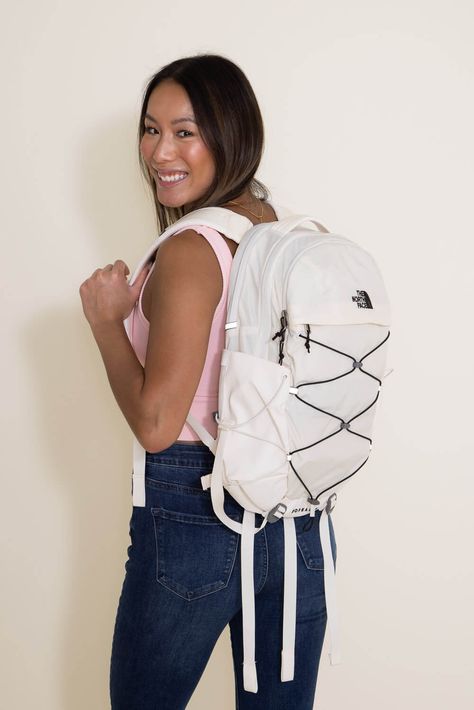 Great for class or traveling, this The North Face Borealis Laptop Backpack for Women in White has simplified organization, many compartments, has a case for a large laptop and has a stand up design. This backpack is everything you need and more! Features: The North Face Style: NF0A52SI-Q4C Color: White The North Face backpacks Large main compartment Tablet Sleeve Sternum Strap with Whistleloc Buckle Front and side elastic bungee system Removable waist belt, with stand-up design Two side bottle p The North Face Borealis, Women In White, North Face Borealis, Face Style, White Backpack, Backpack For Women, Tablet Sleeve, Large Backpack, Hiking Backpack