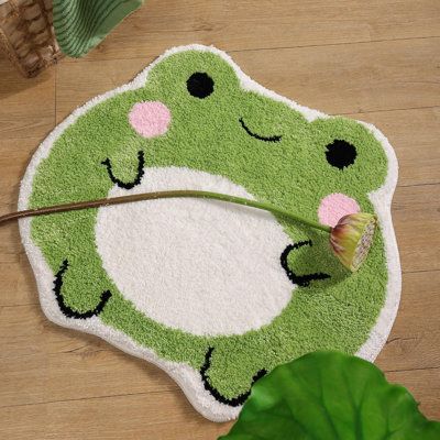 COPYRIGHT RESERVED Cute non slip bathroom mat size is 25.6 inches X 22.4 inches, the green frog pattern of the microfiber bath mat is super cute. This small plush novelty floor rug can be used for bathroom showers, bathtubs, living room, and kitchen door mats. You can also give this funny printed rug as a gift to your friends. Trinx | Trinx Cute Bath Mat Non Slip Frog Bath Rug, Green brown / green / whitePolyester | 25.6" W | Wayfair Frog House Decor, Cute Small Rug, Cool Tufted Rugs, Cute Tufted Rug, Frog Themed Bedroom, Small Tufted Rug, Rug Tufting Ideas Easy, Small Rug Ideas, Tuft Rug Design Ideas