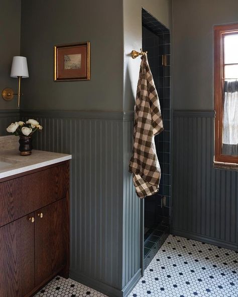 ANNABODE Interior Design | A before + after of the kids’ bath at our #parkhilldenver project. The floor and wainscot were in good condition, so we retiled the shower,… | Instagram Wainscoting Behind Vanity, Guest Bath Wainscotting, Wainscoting Around Bathroom Vanity, Half Laundry Half Bathroom, Modern French Bathroom Ideas, Dark Traditional Bathroom, Tiled Wainscoting Bathroom, Dark Bathroom Wainscotting, Heidi Callier Bathrooms