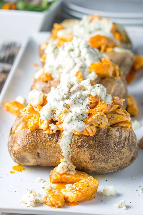 Buffalo Chicken Loaded Baked Potato - Bound By Food Buffalo Chicken Baked Potato, Chicken Loaded Baked Potato, Sweet Hawaiian Chicken Recipe, Sweet Hawaiian Chicken, Chicken Baked Potato, Blue Cheese Chicken, Blue Cheese Crumbles, Hawaiian Chicken Recipes, Chicken Potato Bake