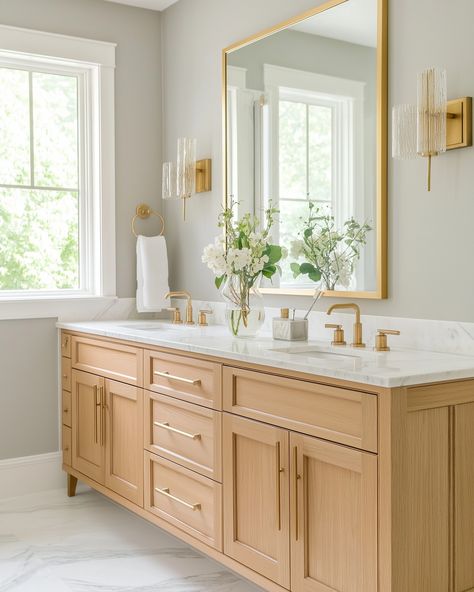 When it comes to creating a space that feels luxurious yet grounded, I love mixing natural tones and textures with sleek, modern fixtures. The oak cabinetry paired with the marble countertops and gold accents here creates that perfect balance of warmth and elegance, don’t you think? I’ve been obsessed with how the natural wood grains pop against the soft grey walls. And who knew a simple touch like fresh florals could transform the entire room? ⁣ ⁣ I’ve found that bringing in natural material... Modern Fixtures, The Marble, Marble Countertops, Grey Walls, Natural Tones, Natural Material, Gold Accents, Natural Materials, Wood Grain