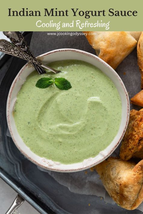 Indian mint yogurt chutney in a bowl with spoon Indian Mint Sauce, Mint Raita Recipe, Mint Sauce Recipe, Mint Yogurt Sauce, Indian Sauces, Tandoori Paneer, Onion Bhaji, Cilantro Chutney, Mint Yogurt