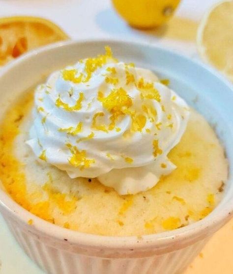 Sweet and tangy and only takes a couple minutes to make, you will fall for this easy lemon mug cake! There are sugar-free, gluten-free, and vegan mug cake options too. I am in love with this quick lemon cake (and I Vegan Mug Cake, Lemon Snack, Banana Bread Mug, Vegan Mug Cakes, Cake In A Mug, Vegan Lemon Cake, Lemon Mug Cake, Easy Mug Cake, Dressing For Fruit Salad