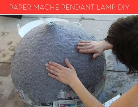 How To: Make a Modern Paper Mache Lamp  Remember back in the day when you made those paper mache masks and impressed all your elementary school friends? Well, paper mache is growing up (in a big way) with today's DIY lamp idea. Paper Mache Lamp, Mascara Papel Mache, Diy Pendant Lamp, Diy Luminaire, Paper Mache Projects, Paper Mache Mask, Lampe Diy, Make A Lamp, Paper Mache Clay