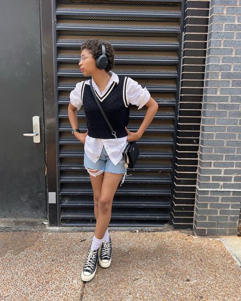 Girl in Black crocheted vest, sony headphones, white dress shirt, black band apple watch, steve madden, boyfriend shorts, converse, natural makeup look, cafe outfit posing. Sweater Vest Outfit With Shorts, Crocheted Vest, Grad Outfits, Sweater Vest Outfit, Fall Vest, Short Vest, Shorts Outfit, Crochet Vest, Summer Fits