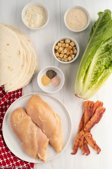 Grilled Chicken Caesar Wrap Recipe - grillonadime.com Chicken Caesar Wrap Recipe, Chicken Caesar Salad Wraps, Grilled Chicken Caesar, Caesar Wrap, Chicken Caesar Wrap, Wrap Recipe, Chicken Caesar, Chicken Caesar Salad, Salad Wraps