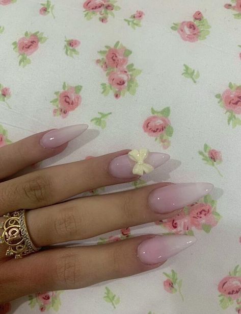 girly gradient pink nails with a cute and simple white bow Pink To White Gradient Nails, Natural Pink And White Nails, Pink And White Gradient Nails, Pink Almond Nails With Bow, Girly Acrylic Nails Almond, Pink Nails With Bow Charm, Coquette Acrylic Nails, Gradient Pink Nails, Nails With Bow Charm