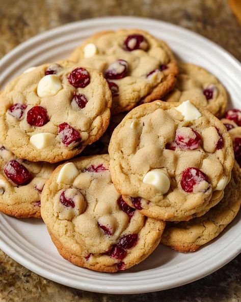 Indulge in soft, chewy White Chocolate Cranberry Cookies—perfectly sweet and tangy. A festive treat that's quick to bake and even quicker to devour! #HolidayBaking #FestiveCookies #WhiteChocolate #CranberryCookies #DessertRecipes White Chocolate Cookies Christmas, White Chocolate Chip Cookies With Dried Cranberries, Christmas White Chocolate Cranberry Cookies, Sugarplum Cranberry Cookies, Soft White Chocolate Cranberry Cookies, White Chocolate Chip And Cranberry Cookies, The Best Soft And Chewy Cranberry White Chocolate Chip Cookies, Subway Cranberry White Chocolate Cookies, Cranberry White Chocolate Cookies Recipe